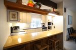Full Kitchen With Breakfast Bar at Waterville Valley Condo